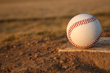Baseball on Pitchers Mound Rubber