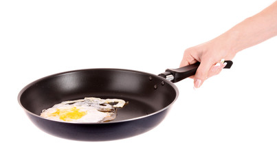 frying pan with vegetables  on white
