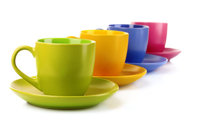 Set of colorful cups on white background