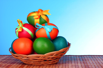 Easter eggs with  bows isolated on white