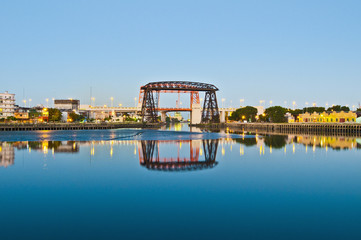 Sunset at Nicolas Avellaneda bridge across Riachuelo.
