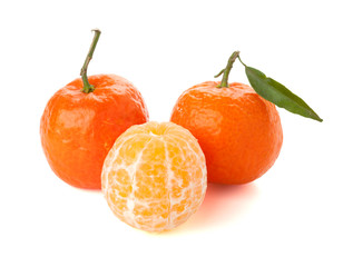 Ripe tangerines with green leaf