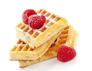 fresh waffles with raspberries isolated on white