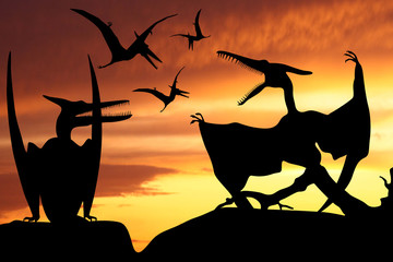 dinosaur world on sunrise background illustration