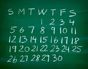 calendar planner on a blackboard