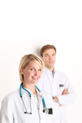 Fototapeta premium Schöne Ärztin mit Kollegen