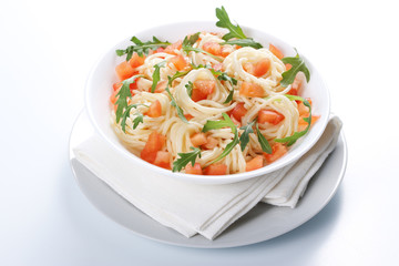 Pasta with tomato and rucola