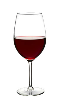 Red wine in wine glass on white