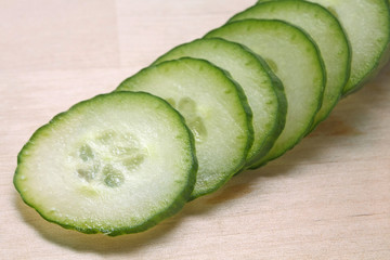 Cucumber on a wooden board