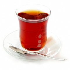 Glass of black tea isolated on white background