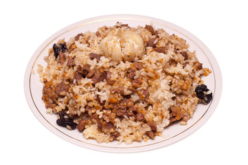 Caucasian traditional pilaf. Rice with meat