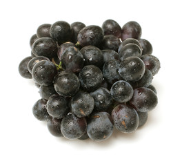 bunch of black grapes with droplets