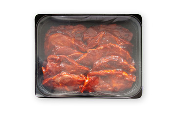 Grillfleisch mariniert und verpackt