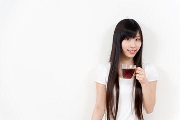 beautiful asian woman with a cup of tea