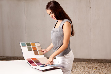 Interior Architect Choosing Rug Sample