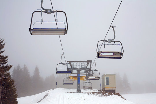 Ski lift in the fog