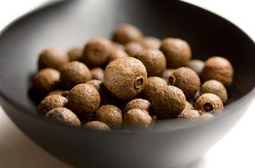 Spoon and pepper isolated