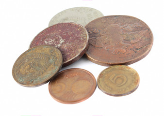 old coins on a white background