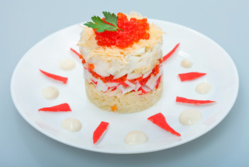 Salad of crabs with, cheese and red caviar
