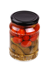 The clear glass jar of colorful pickled vegetables