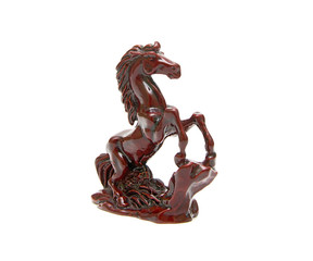 Figurine of a horse on a white background close up