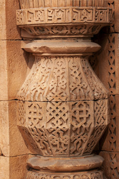 Stone carvings adorn a column at Qut'b Minar in Delhi.