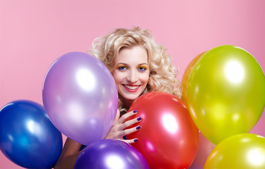 Fototapeta na wymiar blonde girl with balloons