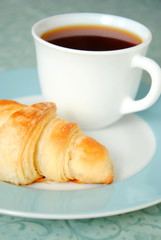 Croissant and a cup of tea