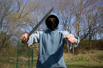 robber with a machete