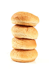 Fototapeta na wymiar stack of buns with sesame isolated on white