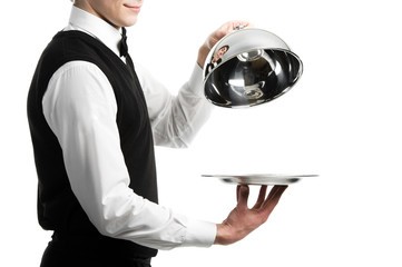 hands of waiter with cloche lid cover - obrazy, fototapety, plakaty