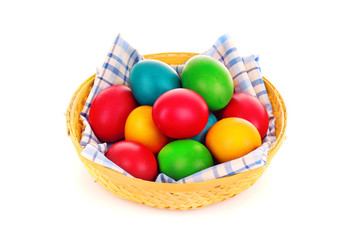 Easter eggs in backet isolated on white