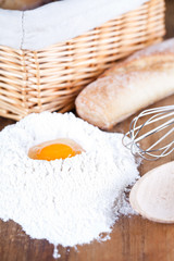 bread, eggs, whisk and flour