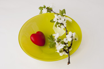 plum branch and heart on plate