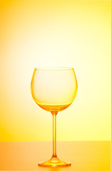 Wine glasses against gradient background