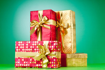 Celebration concept - Gift box against colorful background