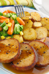 Pork meat with vegetables and sauce