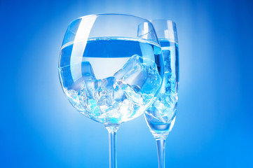 Water in the glass against gradient background