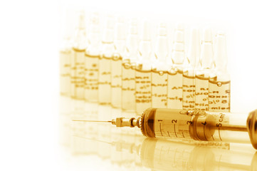 Ampules and syringe