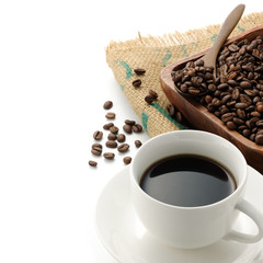 A cup of coffee with beans