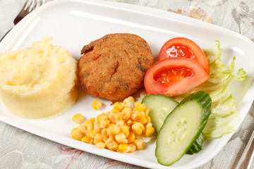 meat with potatoes and vegetables