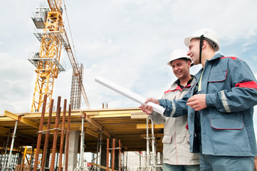 Fototapeta na wymiar Engineers builders at construction site