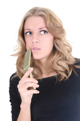 Obraz premium Blonde thinking woman with phone