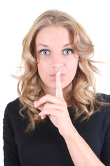 Naklejka premium Blonde woman showing shhh sign