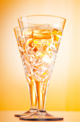 Water in the glass against gradient background