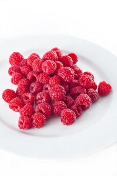 fresh raspberries on a plate