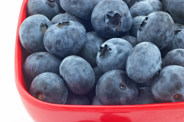 Blueberries in red dish