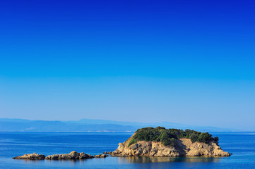 Fototapeta na wymiar Small island in the Aegean