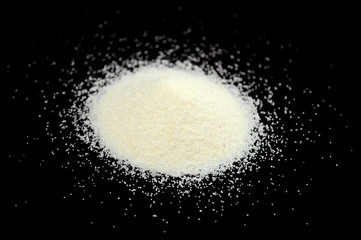 Pile of Semolina on Black Background