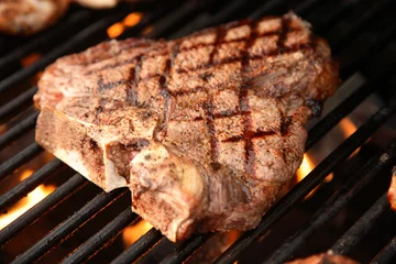 Papier Peint photo Lavable Grill / Barbecue T-Bone Steak on the Grill